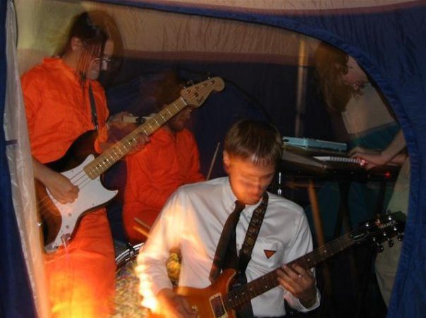 Eat Avery's Bones playing in a tent in J&J's basement, 2006. Photo by Layla Blackshear.