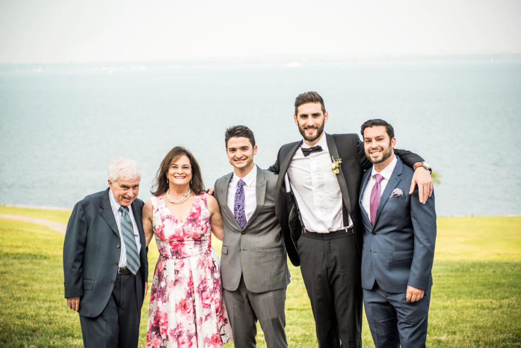 Family Man: Ira and Debbie with their three sons, (from left) Zach, Michael, and Jonathan, at a wedding in 2015.