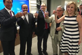 Esteemed guests celebrated the opening of Softtek's regional headquarters in Addison with a toast of tequila. 