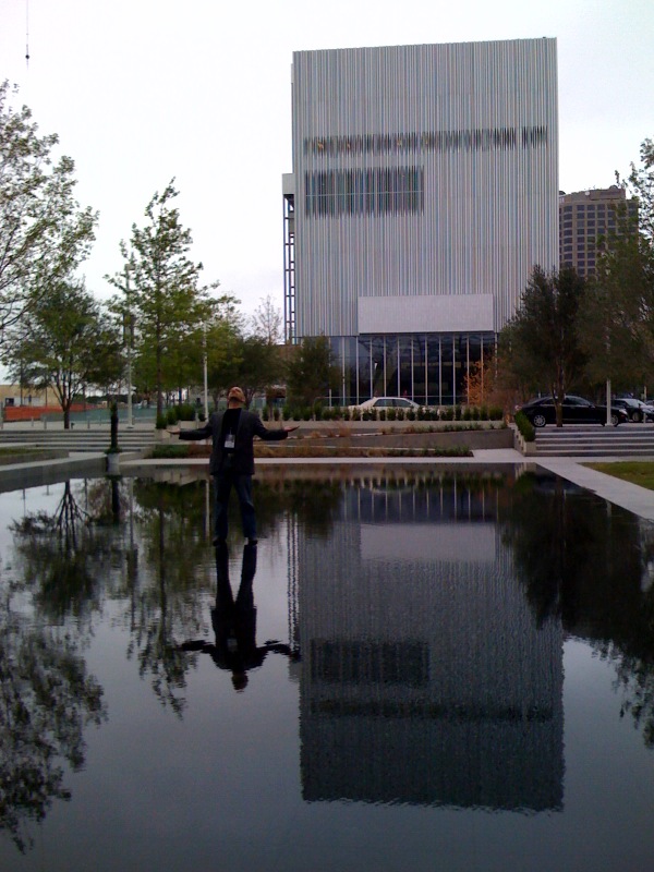 I put up an earlier pic of landscape architect Michel Desvigne walking through his shallow reflecting pond. As a couple of us shot pics, he seemed embarrassed for the attention. Eric Celeste, on the other hand, decided to play Jesus. One more point: I love the space between the two buildings. And I understand why they named it the Elaine D. and Charles A. Sammons Park rather than the Elaine D. and Charles A. Sammons Space Between the Buildings. But still. Would you call it a park?
