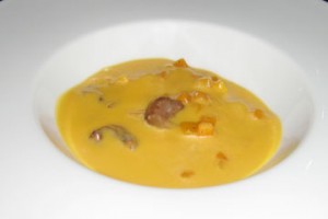 King crab and butternut squash bisque with glazed chestnuts.