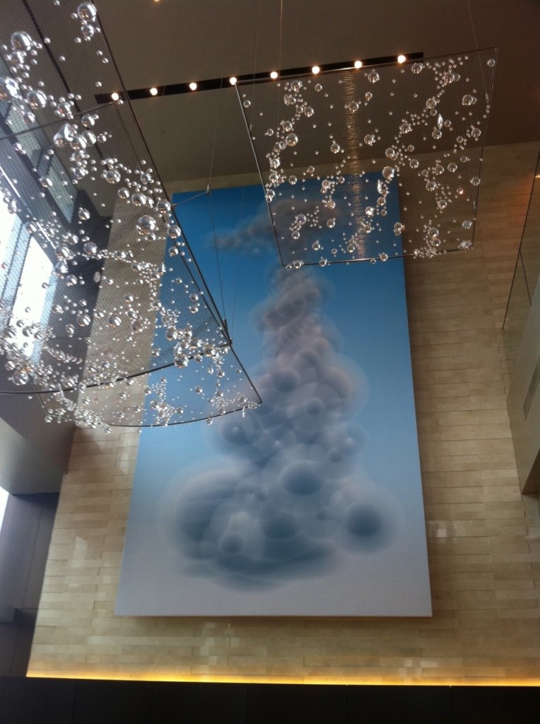 The hotel displays more than 6,700 commissioned art pieces in the guest rooms and public space from 145 local artists. This enormous cloud canvas hanging in another part of the lobby was done by Ted Kincaid.