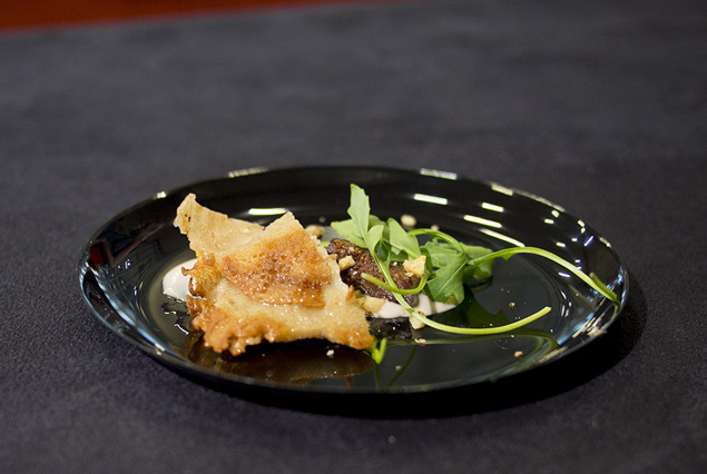  Bistro 31's warm duck confit and goat cheese with poached figs, arugula, and walnut - white truffle emulsion.