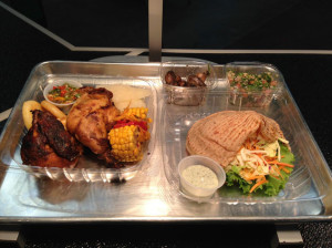 Rotisserie Chicken, Arepitas, Corn and Yucca (left);  Pita Burger, Garlic Mushrooms and Salad (right) via The Right Choice's Facebook page