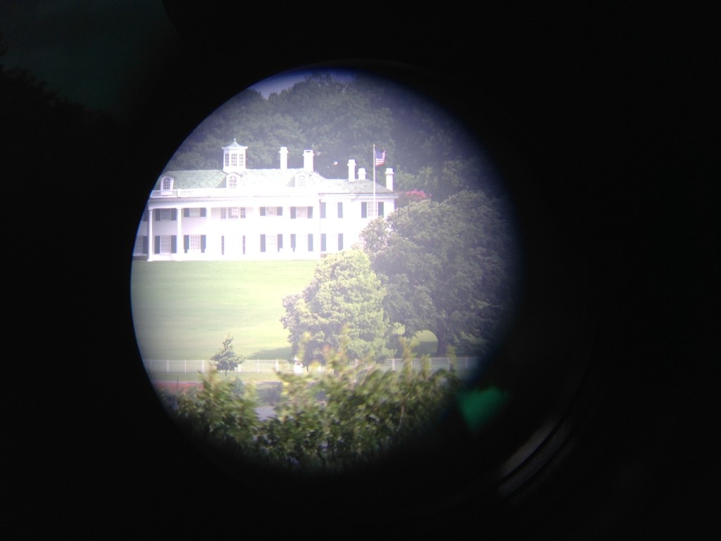 Through the spyglass, you can see John Amend's replica of Mount Vernon, which is on the market for $30 million