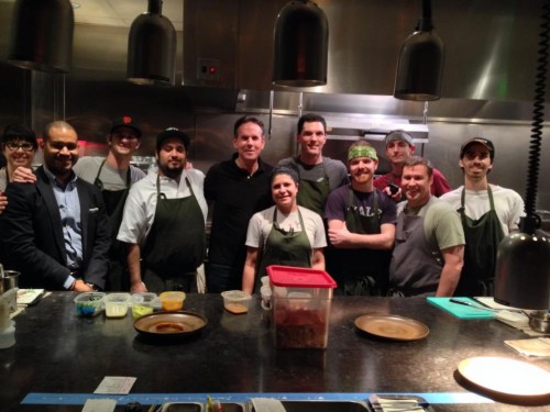 Thomas Keller (5th from left) stands next to Matt McCallister in the kitchen at FT 33. (Photo courtesy of FT 33's Facebook page)