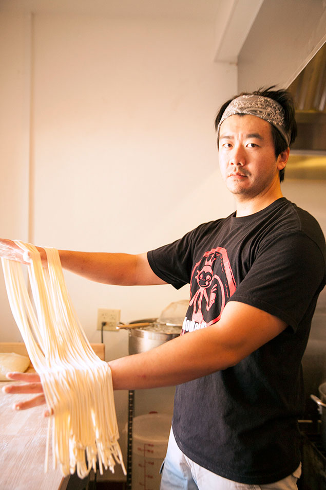 Andrew Chen pulls these long noodles at Monkey King Noodle Co. every day (photography by Desiree Espada)