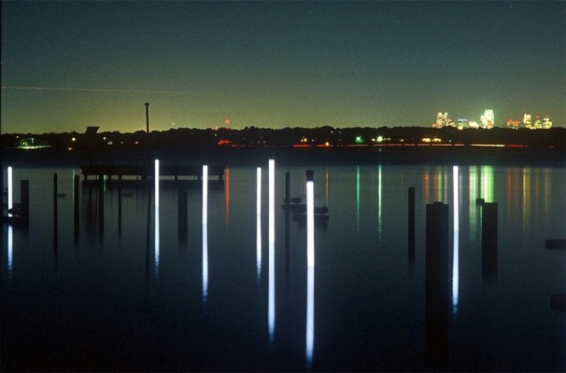 Francis Bagley and Tom Orr, "Wildlife Water Theater," 2001 (night view) 43 steel poles, 20 polycarbonate light poles, 15 floating fiberglass disks, 10 cast stone land elements, 12 aluminum educational wildlife charts, 1 solar system. Courtesy of the artist.