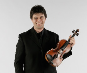 Violinist and co-concertmaster, Nathan Olson. 