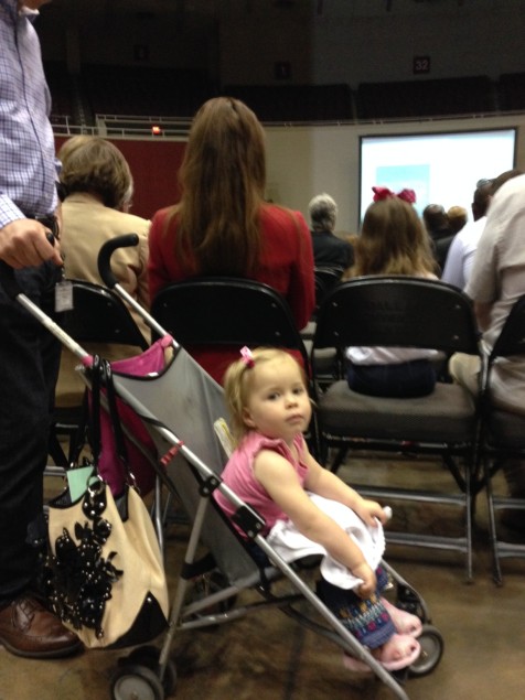 That's Angela Hunt in the red suit. That's one of her kids in the stroller. I considering calling CPS to report that she was abusing her kids by taking them to a transportation meeting.