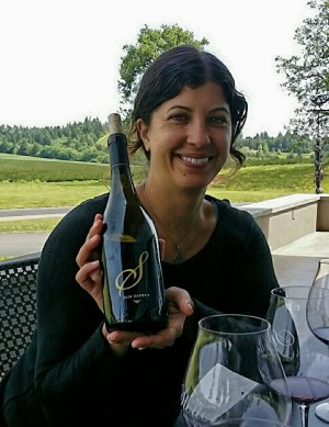 Stoller Winemaker Melissa Burr with her premium Pinot Noir, Stoller 2010 Cathy's