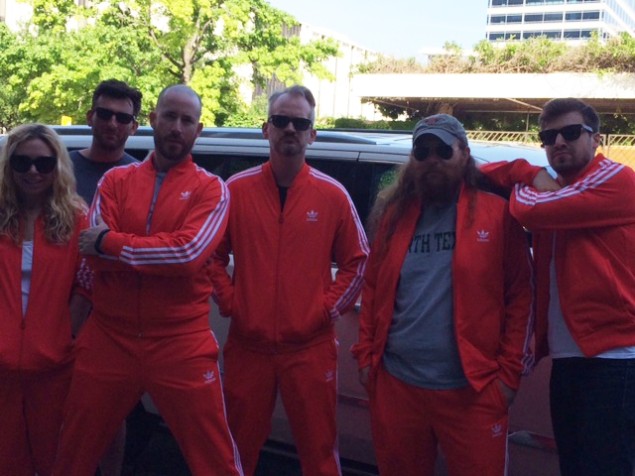 Arts editor Peter Simek has been kidnapped by a bunch of maniacs in red-orange track suits. 