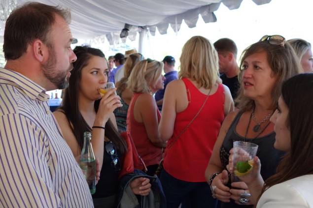 Martensen and Rachael Wallace ( works al Biernat's)  chat with Monica Greene at Texas Wildca