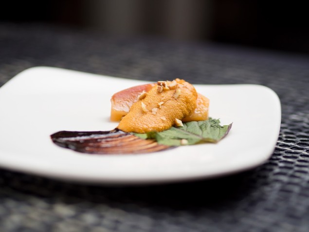 Uni with Peach, Shiso, Pecan and Black Bean Paste. (Photography by Louie Solomon)