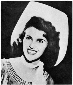 Old publicity still of Wanda Jackson, as a 17-year-old rock singer. Public domain. 