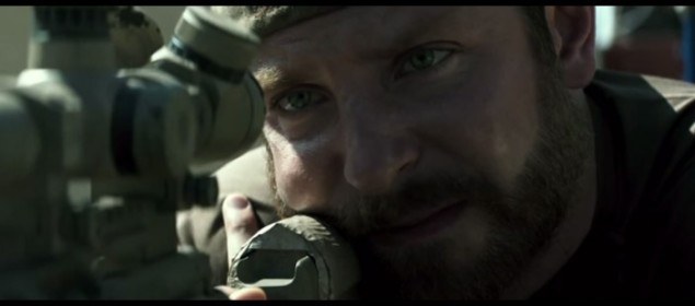 Bradley Cooper as Chris Kyle taking aim.