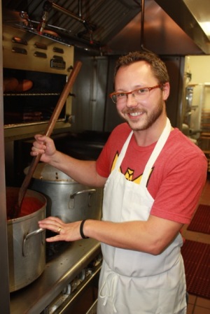 Sammy Mandell making pizza sauce. Photo by Lauryn Bodden.