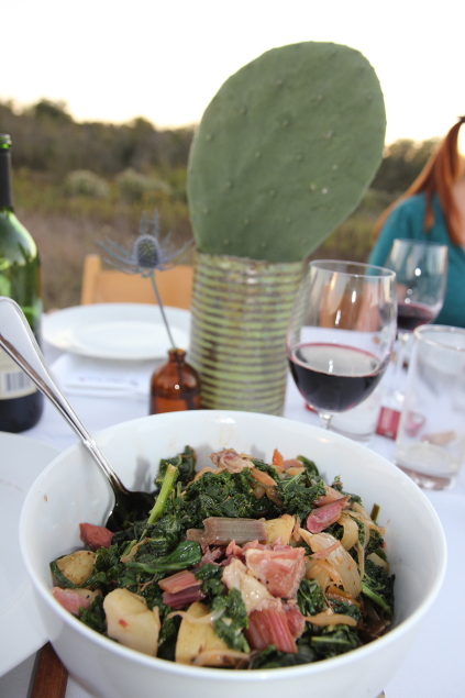 Braised greens with smoked ham hock. (Photography by Nancy Nichols)