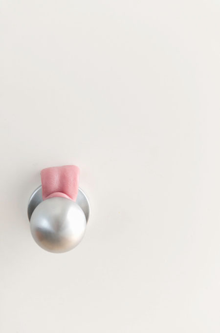 Asian Licking Doorknob, 2014. Latex 2 x 3.5 x .5 in