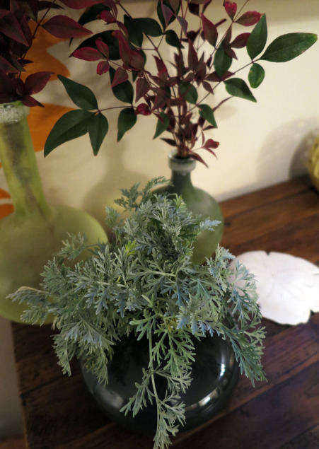 Artemisia is an easy filler or feature in a squat glass vase.