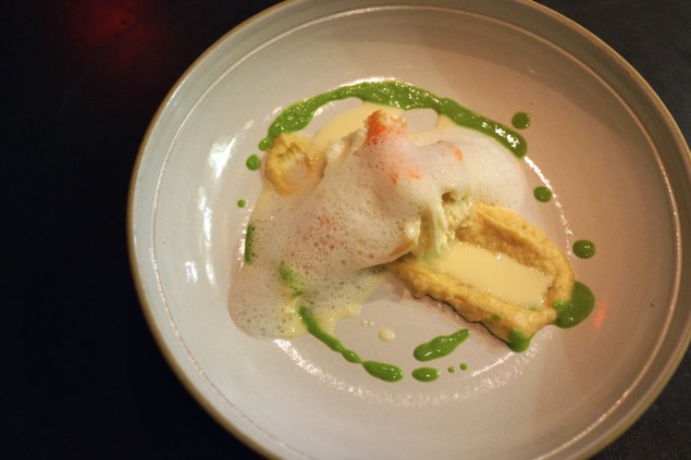 Butter-poached king crab with smoked potato purée, parsley emulsion and garlic. Photo by Brad Murano.