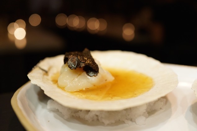 Live diver scallop with shollots, brown butter, dashi and shaved black truffle. Photo by Brad Murano.