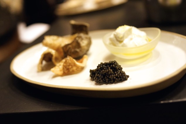 Sturgeon chicharron with spanish yogurt and olive oil. Photo by Brad Murano.