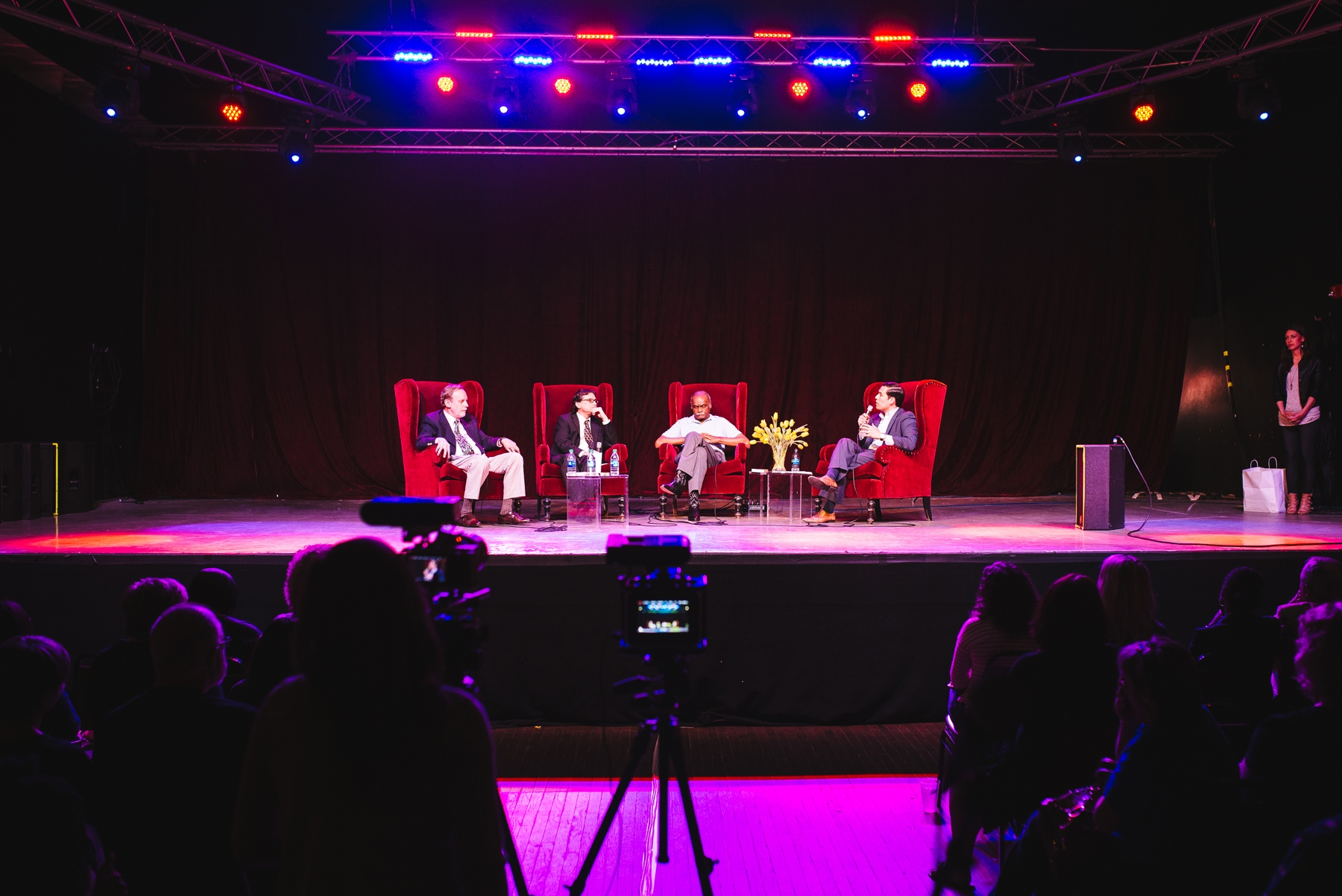 Jim Schutze, Michael Phillips, Peter Johnson, and Miguel Solis on stage