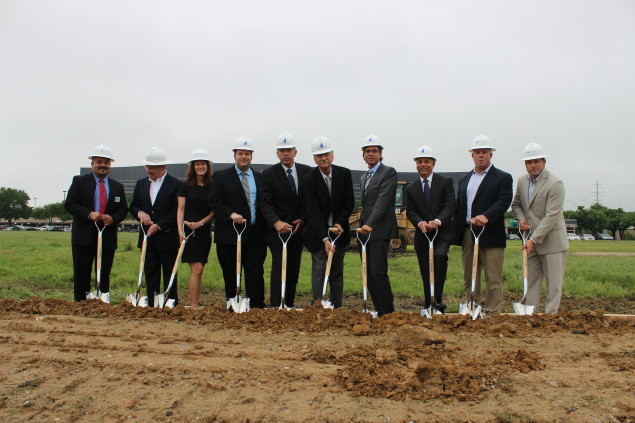 Officials from Cawley Partners, the Town of Addison, and others associated with Tollway Center at the project's groundbreaking ceremony.