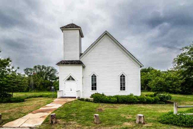 This frontier church is tucked away on acres of "virgin prairie" in Far North Dallas.