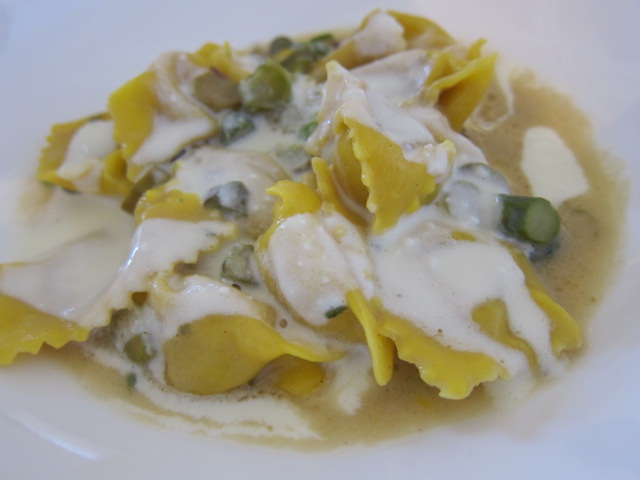 Agnolotti pasta with asparagus and fava beans with hazelnut cream in Piedmont, photo by Hayley Hamilton Cogill