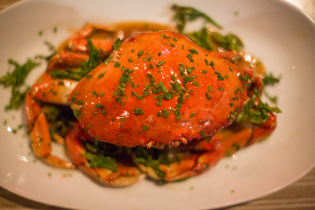 Stir-fried dungeness crab with red boat fish sauce.
