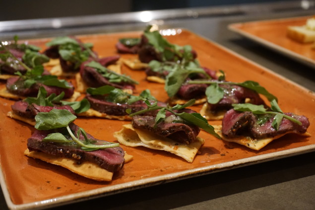 Tarragon peppered ostrich carpaccio.