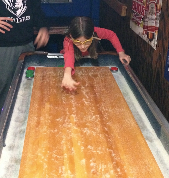 Why would a 9-year-old girl play shuffleboard at Shady Side while wearing swim goggles? That's just the kind of place it is. Or was.