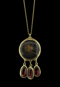 18K black sapphire and garnet peacock pendant necklace