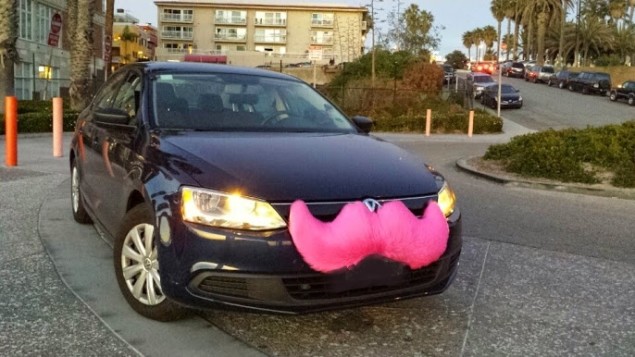 When Lyft launched, big pink mustaches were used to identify its drivers.