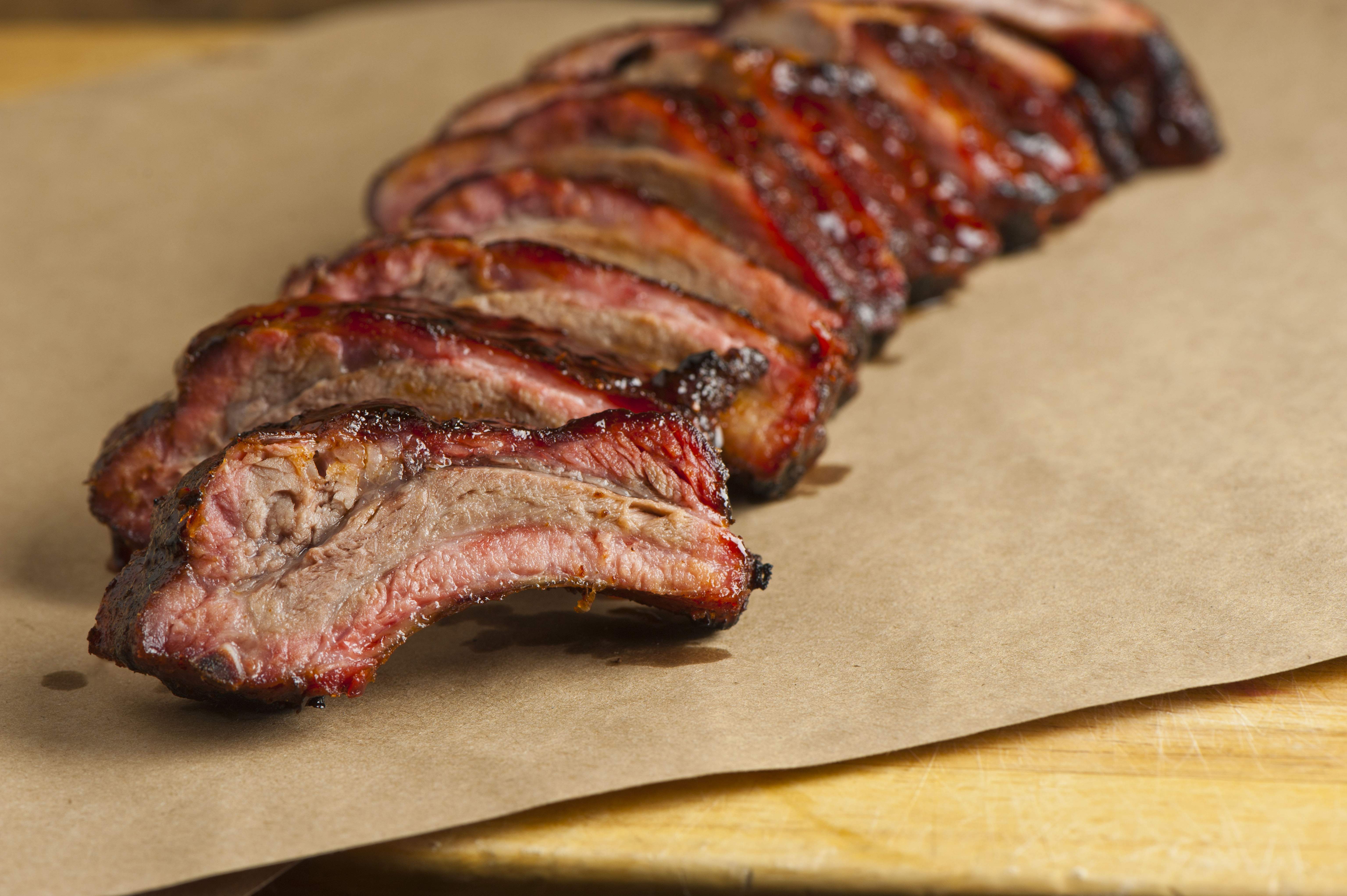 A fanned out slab of sliced brisket.