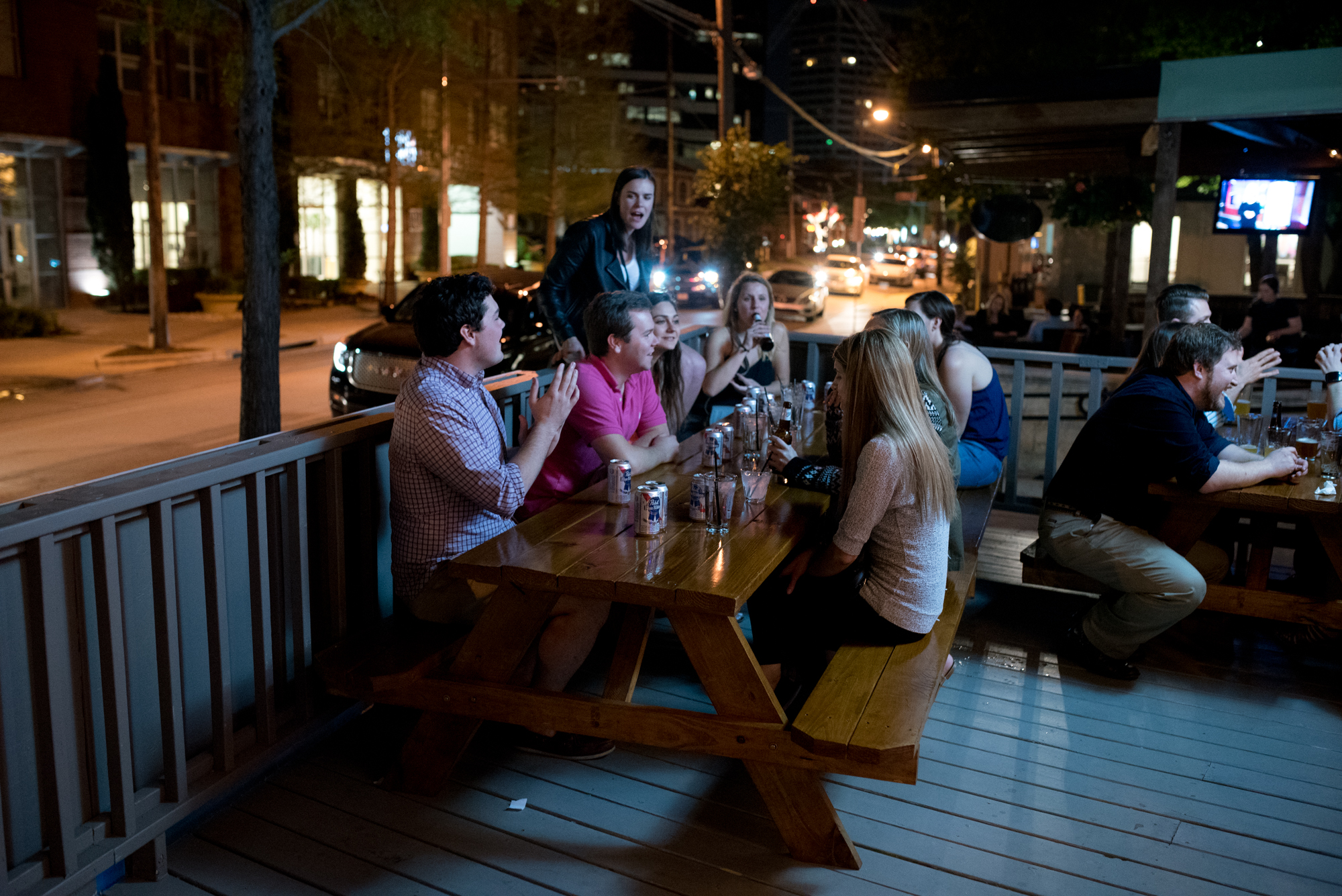 The bar features a light-strewn patio–perfect for a warm night.