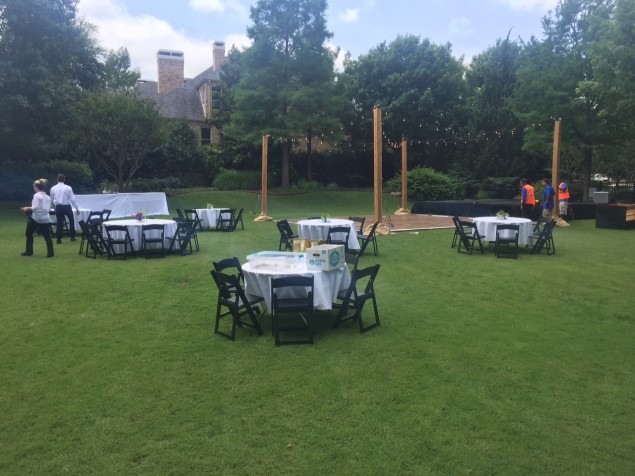 Work crews setting up for Janet Jensen's AT&T Byron Nelson party, early Saturday morning.