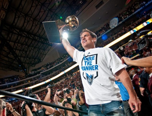 Cuban walks into the AAC with the Larry O'Brien in 2011.  (Photo: Elizabeth Lavin)
