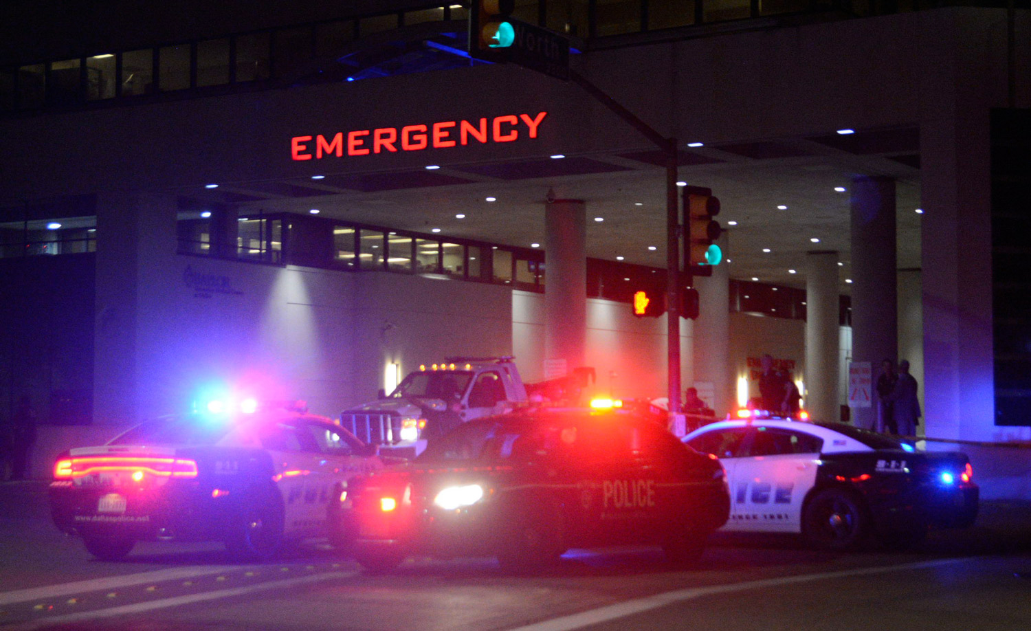 Dallas Police cars in front of the Baylor University Medical Center in the early hours of July 8. (Photo: Mark Kaplan/Newscom)