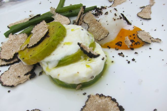 Avocado, scamorza and poached egg with black summer truffle at L'Assencio