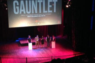 Tech Wildcatters CEO Gabriella Draney Zielke (center) announces the syndicated seed rounds of funding for Selery Fulfillment and Tech Edventures at Wednesday's pitch day.