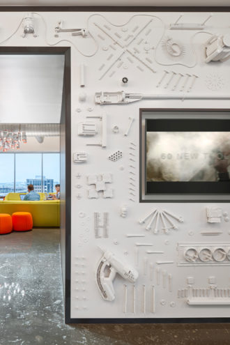 Manufacturing company Hilti embedded its own tools in a wall at its North American headquarters in Plano, turning its business into an art piece. 