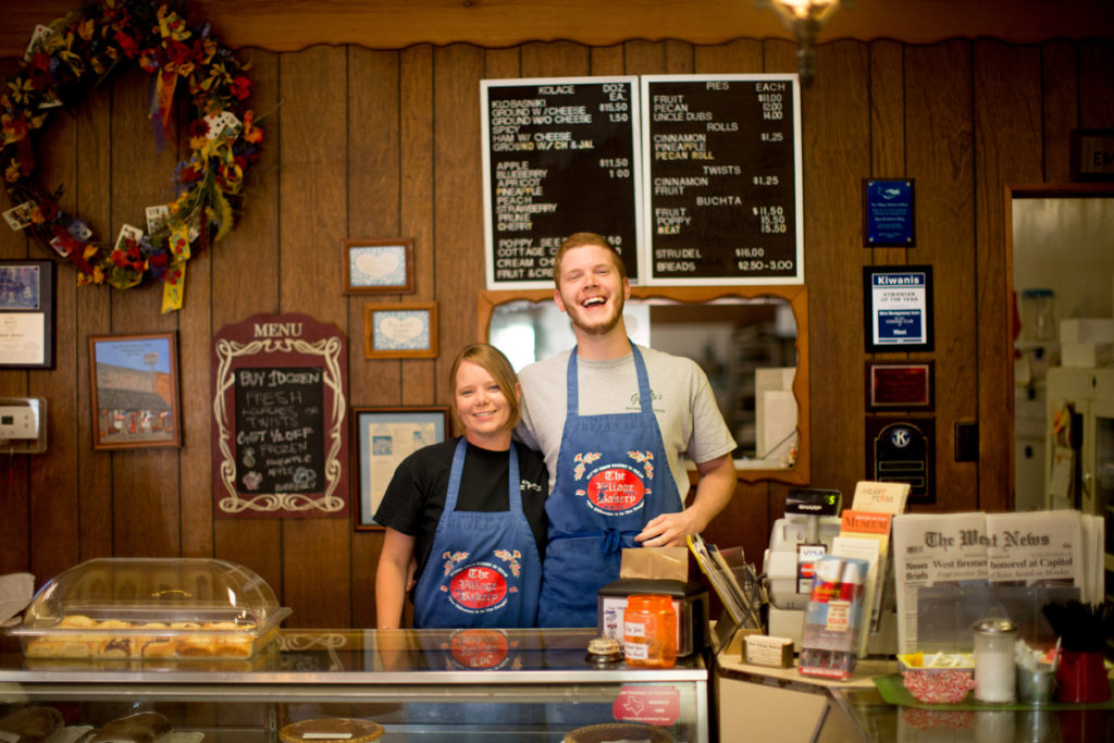 Counter Culture: Jackie Liles and Seth Wolske work at the Village Bakery, which has been in downtown West since the 1950s. Other than being the oldest bakery in town, Village’s claim to fame is inventing klobasniki. 