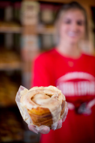 Know Your Roll: Gerik’s Ole Czech Bakery was founded in the 1970s as Nors Bakery and has remained a fixture on Oak Street since then, even as it has changed owners and downsized slightly. And its offerings are better than ever, with this softball-size cinnamon roll on the menu. (Opposite page) When Slovacek’s came to West, it brought back Nemecek Bros. Meat Market’s signature ring bologna.