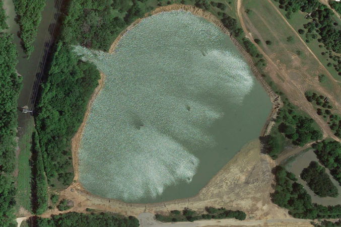 3. By April 2016, the pit had filled and breached a wall (10 o’clock position), pouring possibly contaminated water into the Trinity floodplain, a serious issue for the EPA and the TCEQ.