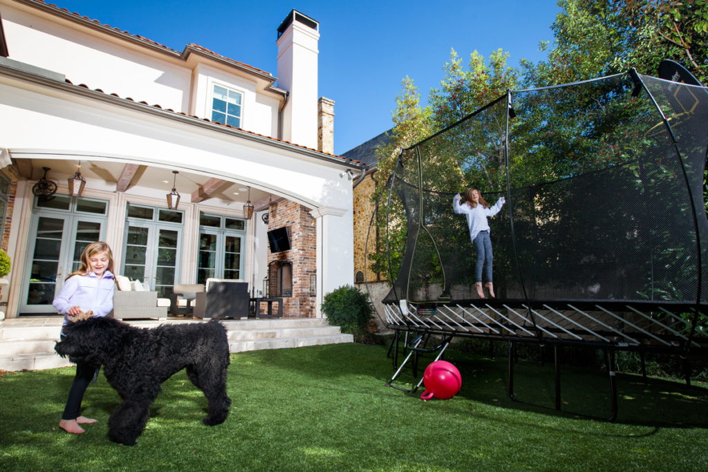 Cameron loves to recruit her sisters to jump on the trampoline with her after school. Their 10-month-old dog Dylan is even tempted to get in on the action. 