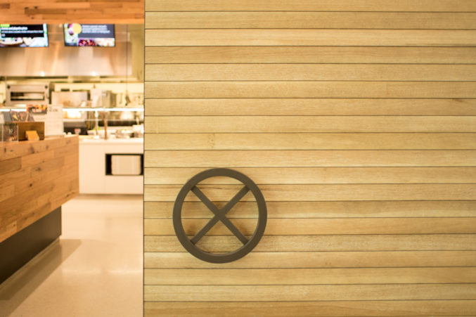 The "X" on the door to the cafeteria at the Perot Co.'s headquarters has a significance to the family that dates back nearly a century. (Photo: Jessica Chen)