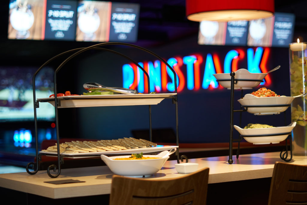 Plan Your Holiday Party Early with PINSTACK's Easy, Fun Event Packages